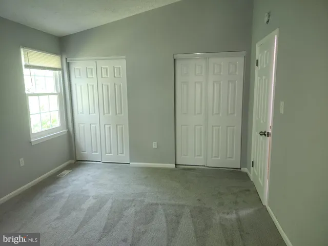 a view of an empty room with window