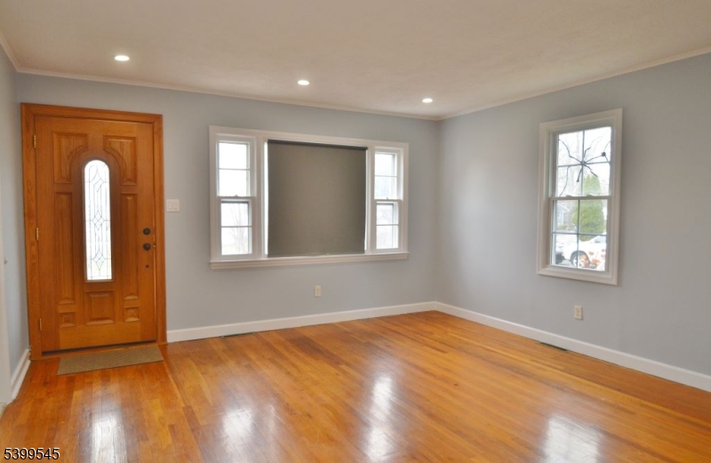 11 Bogota Road Parsippany, NJ 07054 - Photo 7 of 12 wooden floor in an empty room with a window
