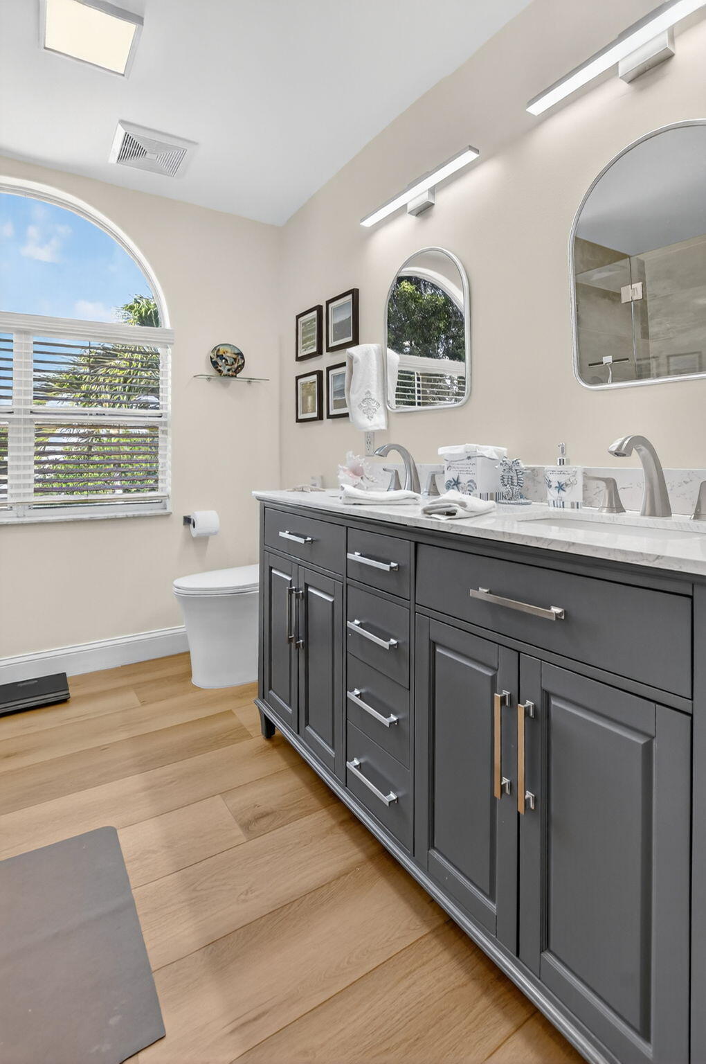 7816 Travelers Tree Drive Boca Raton, FL 33433 - Photo 34 of 61 a spacious bathroom with a granite countertop sink mirror and a bathtub