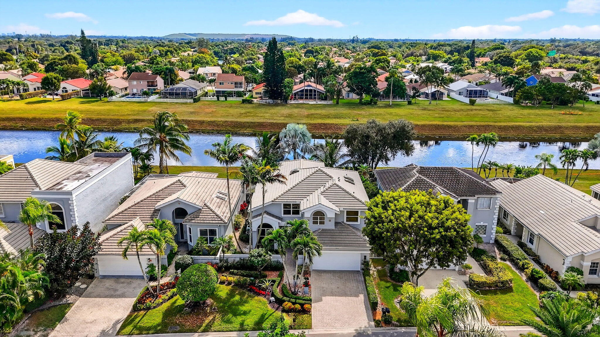 7816 Travelers Tree Drive Boca Raton, FL 33433 - Photo 52 of 61 an aerial view of a house with a swimming pool garden and patio