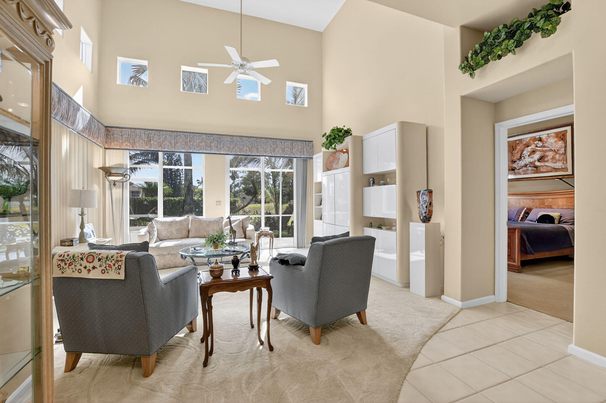 7816 Travelers Tree Drive Boca Raton, FL 33433 - Photo 8 of 61 a view of a livingroom with furniture window and outside view