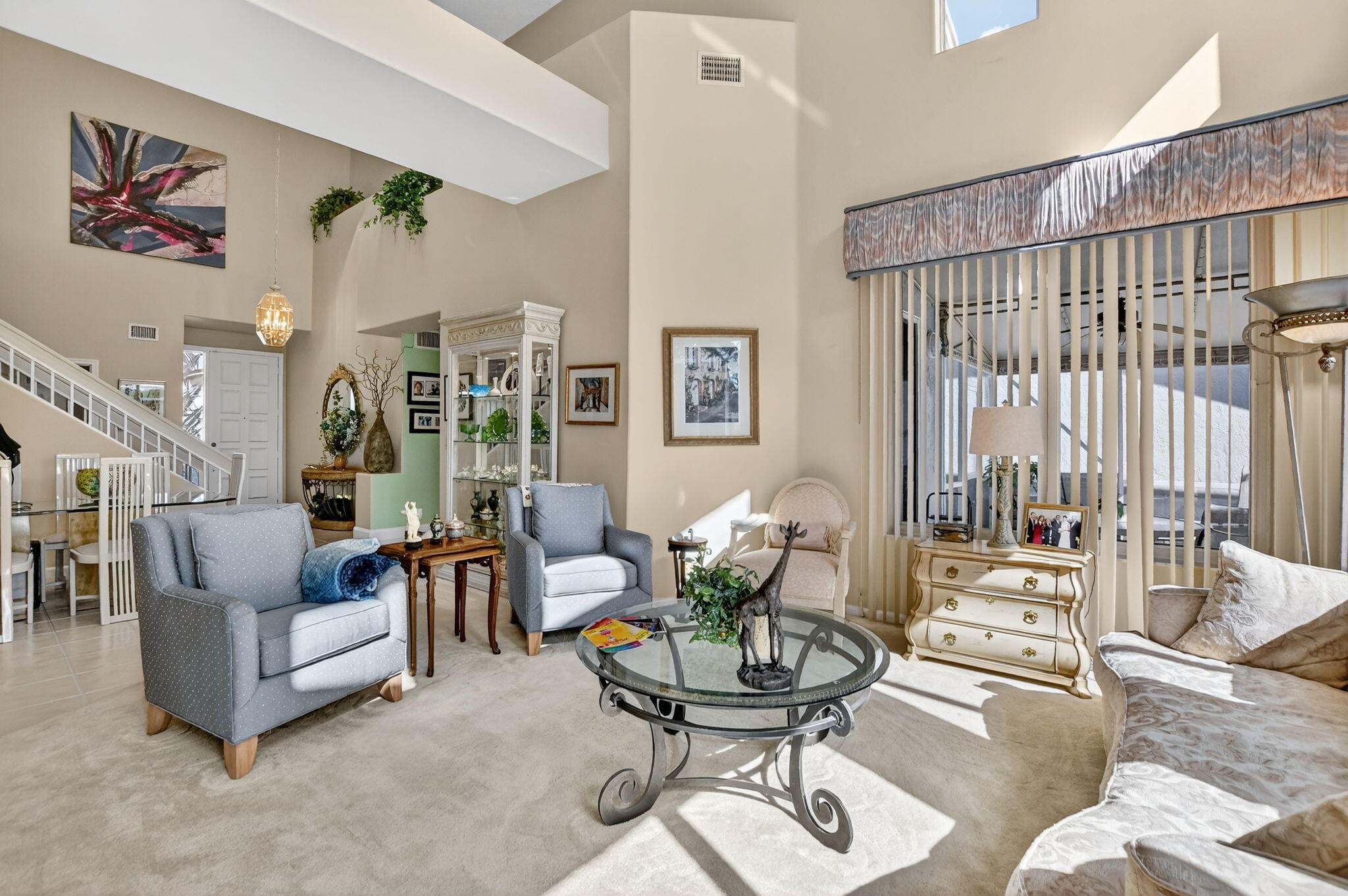 7816 Travelers Tree Drive Boca Raton, FL 33433 - Photo 9 of 61 a living room with furniture and a large window