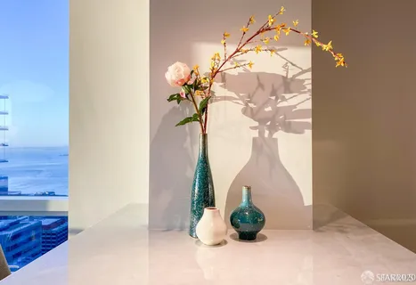 a vase of flowers sitting on a table