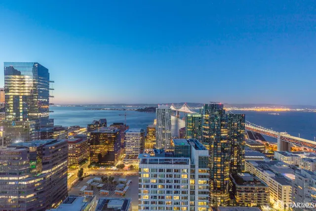 a view of a city with tall buildings