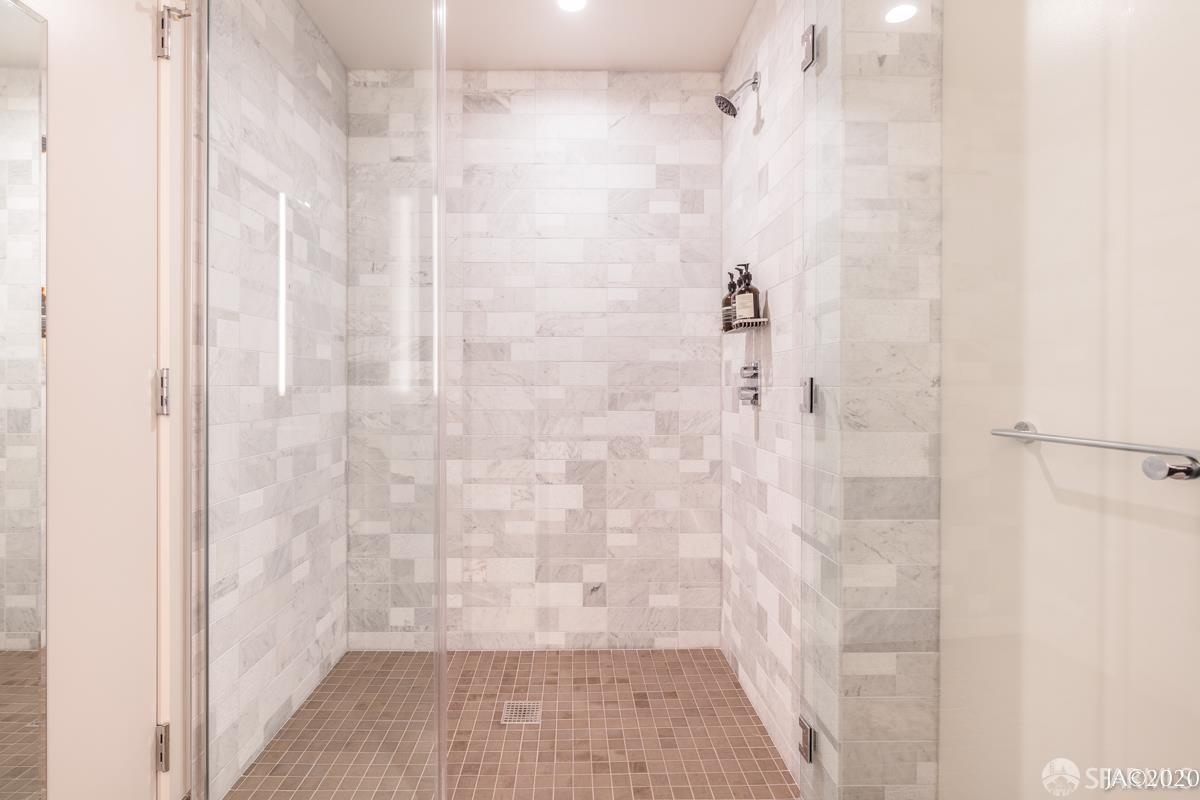 488 Folsom Street, Unit 4102 San Francisco, CA 94105 - Photo 41 of 46 a bathroom with a shower