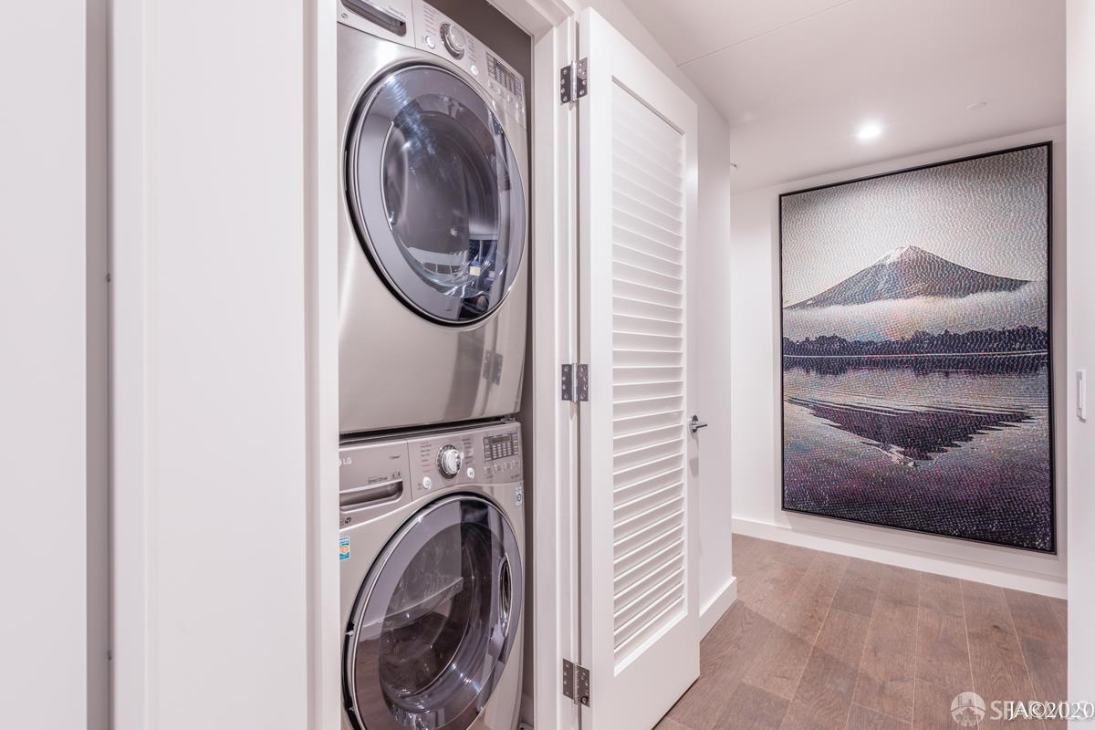 488 Folsom Street, Unit 4102 San Francisco, CA 94105 - Photo 44 of 46 a view of a hallway with washer and dryer