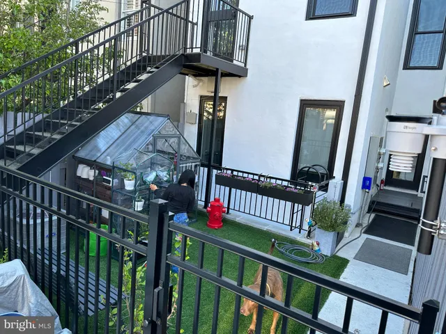 a view of balcony with furniture