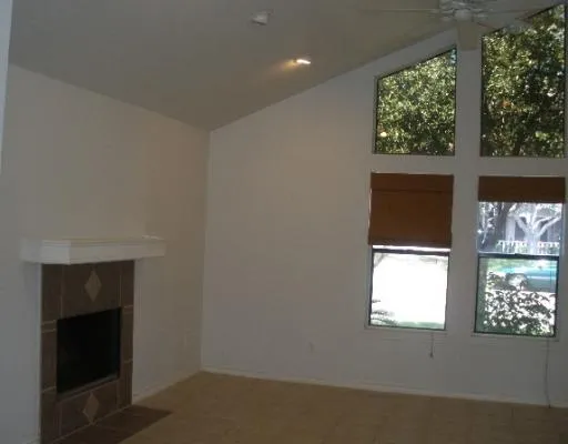 a view of a kitchen from the hallway