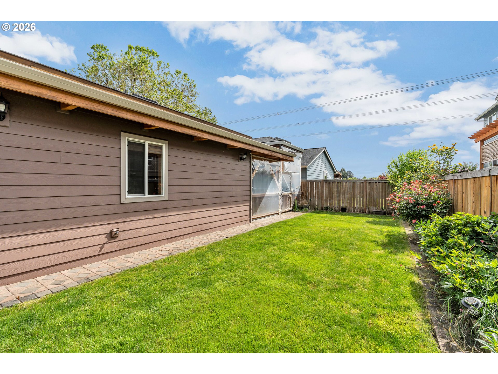 21498 Southwest Jay Street Beaverton, OR 97003 - Photo 42 of 47 a view of a backyard with a garden
