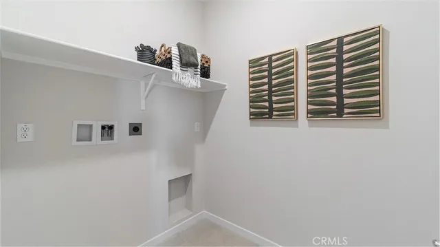 a view of kitchen and utility room