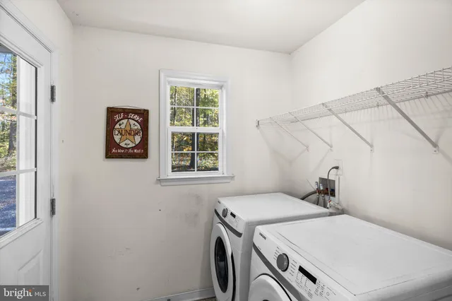 a workspace with furniture and a window