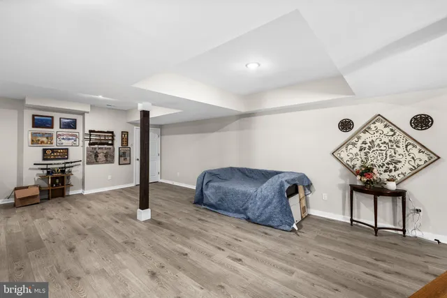 a view of a wooden deck with furniture