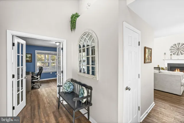 a work room with furniture and windows