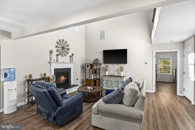 a kitchen with stainless steel appliances granite countertop a refrigerator stove and sink