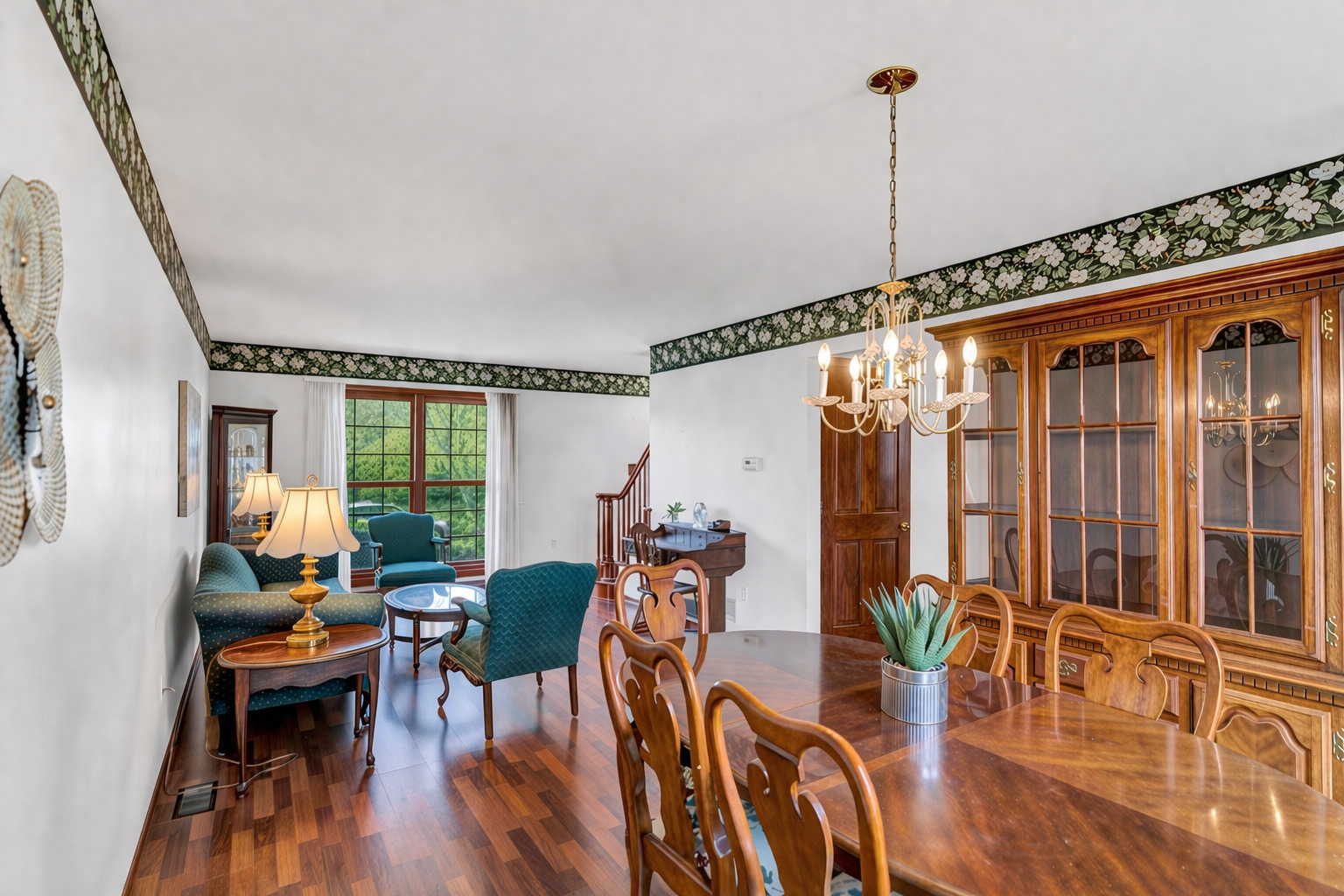 842 Pin Oak Circle Cary, IL 60013 - Photo 14 of 37 a dining room with furniture window and wooden floor