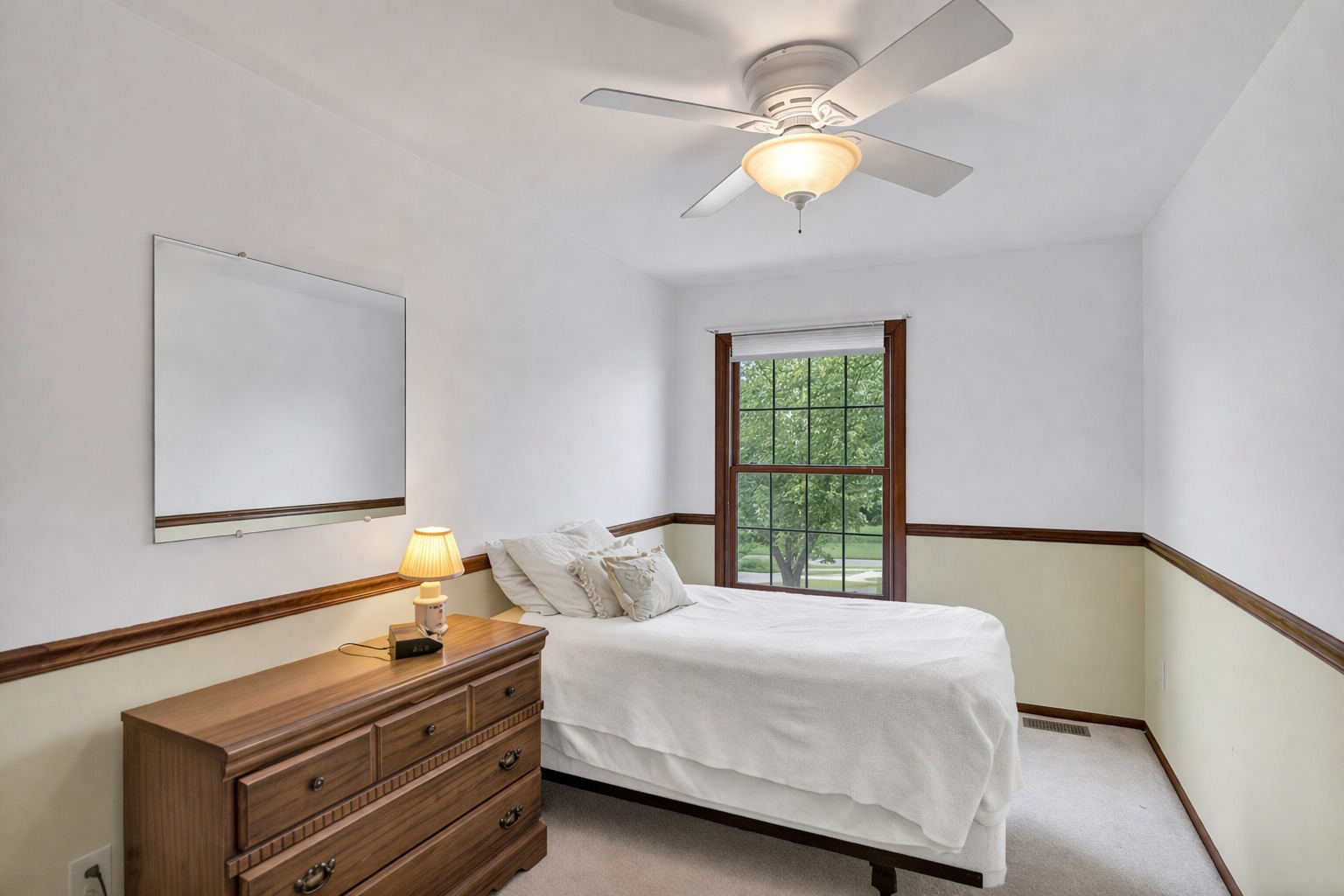 842 Pin Oak Circle Cary, IL 60013 - Photo 19 of 37 a bedroom with a bed and a chandelier