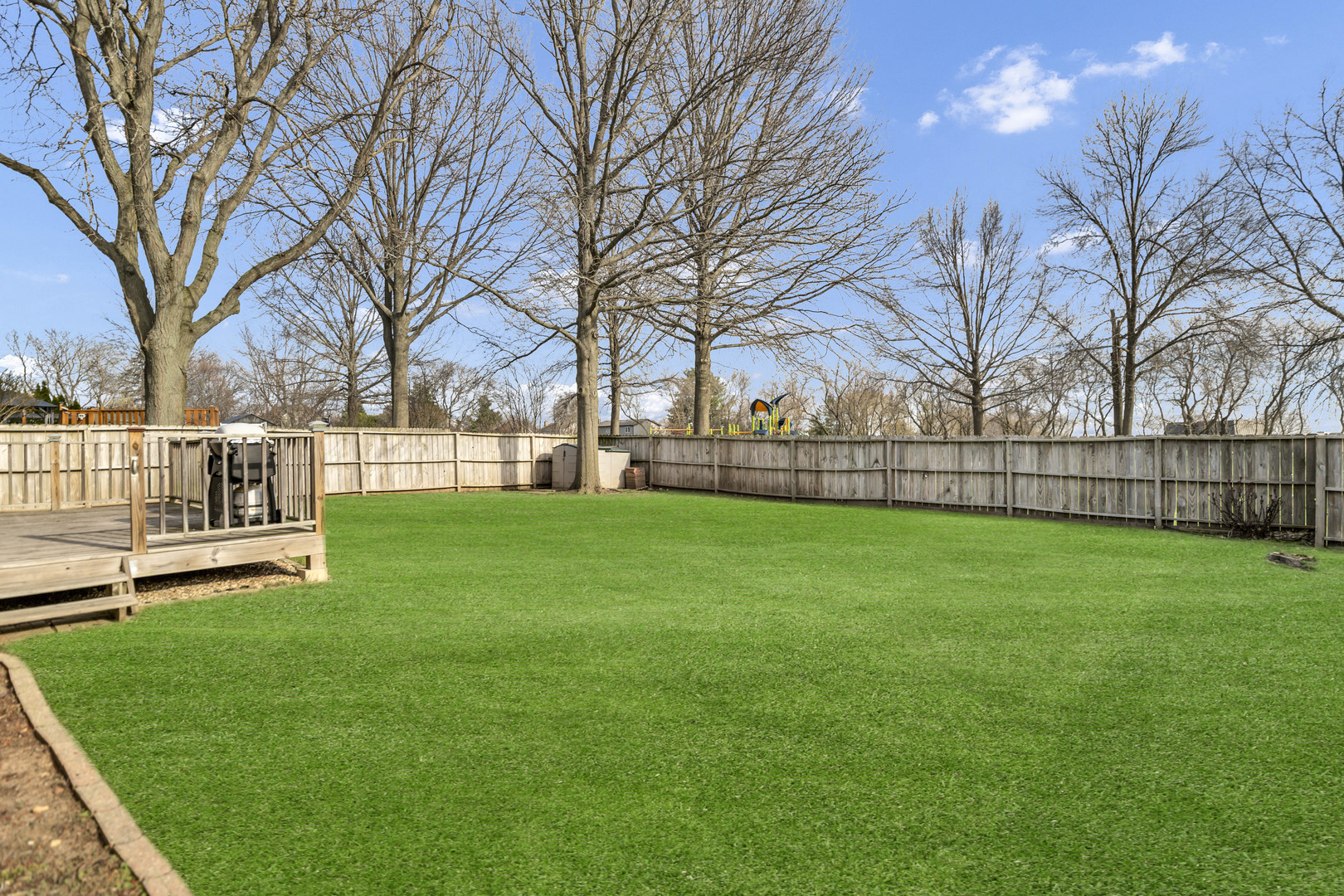 842 Pin Oak Circle Cary, IL 60013 - Photo 33 of 37 a view of a yard with a house in the background