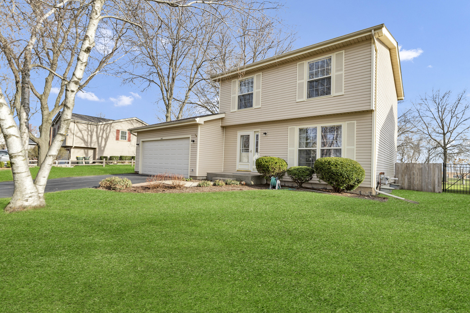 842 Pin Oak Circle Cary, IL 60013 - Photo 37 of 37 a view of a house with backyard and a tree