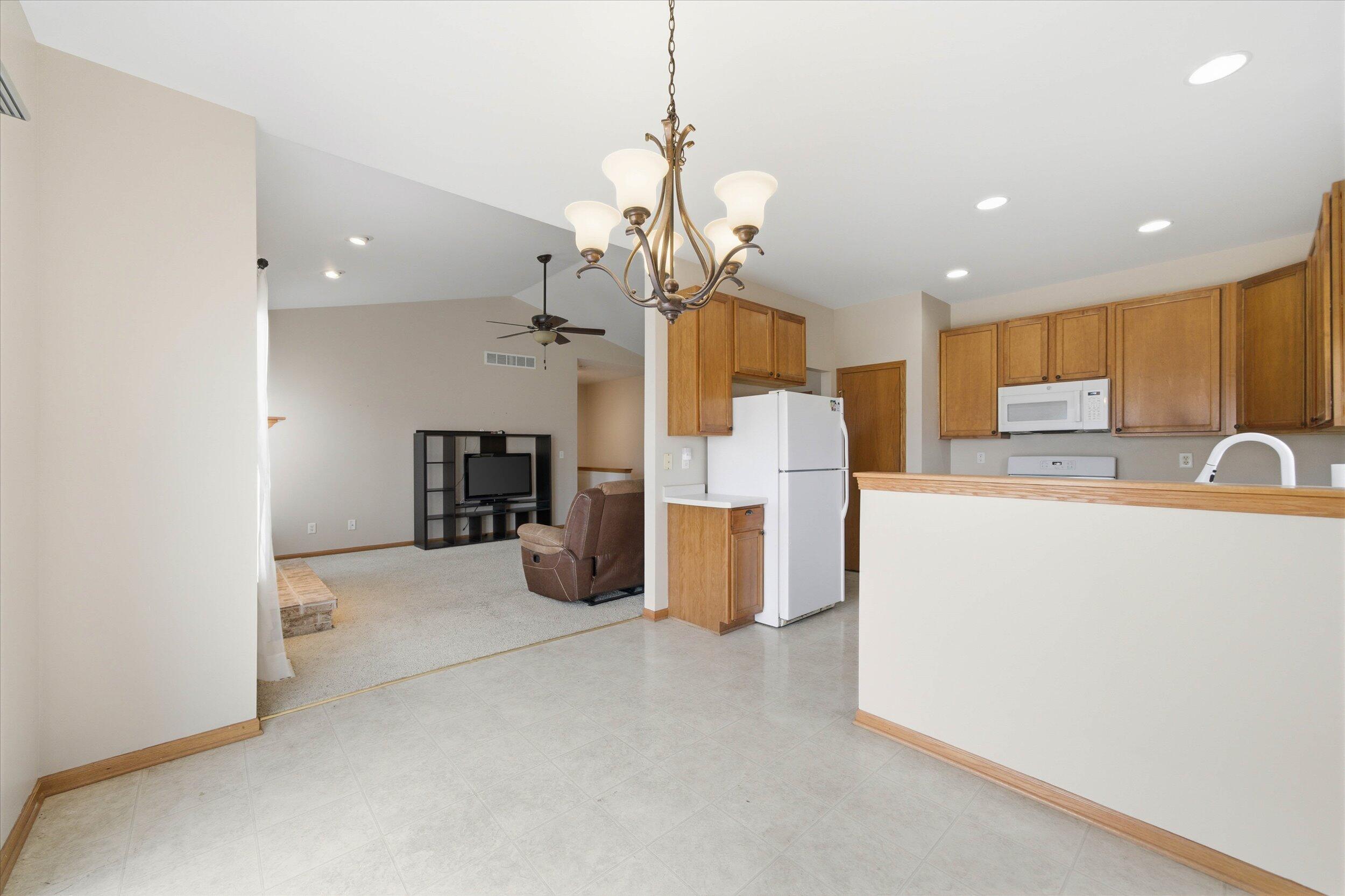 N8330 Whippoorwill Road Ixonia, WI 53036 - Photo 12 of 55 Dining Room to Living Rm/Kitchen