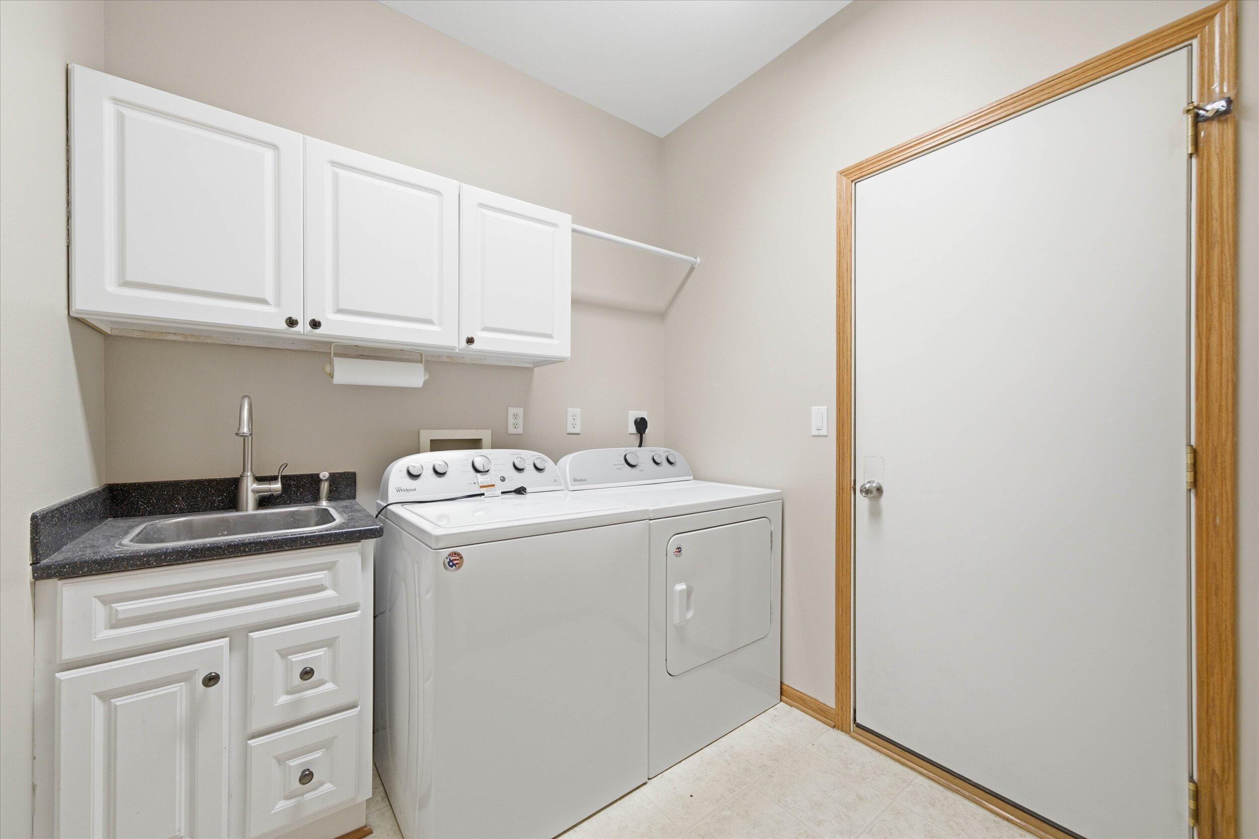 N8330 Whippoorwill Road Ixonia, WI 53036 - Photo 27 of 55 First-Floor Laundry