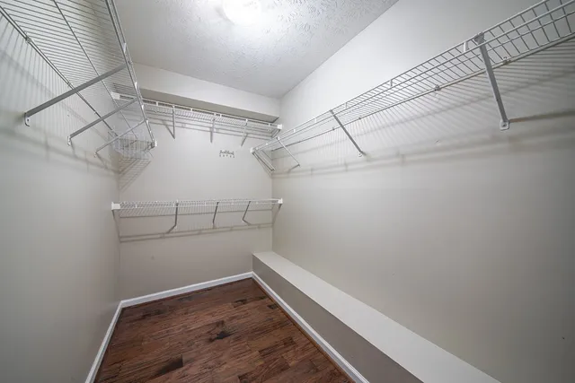 a view of a room with racks on the wall