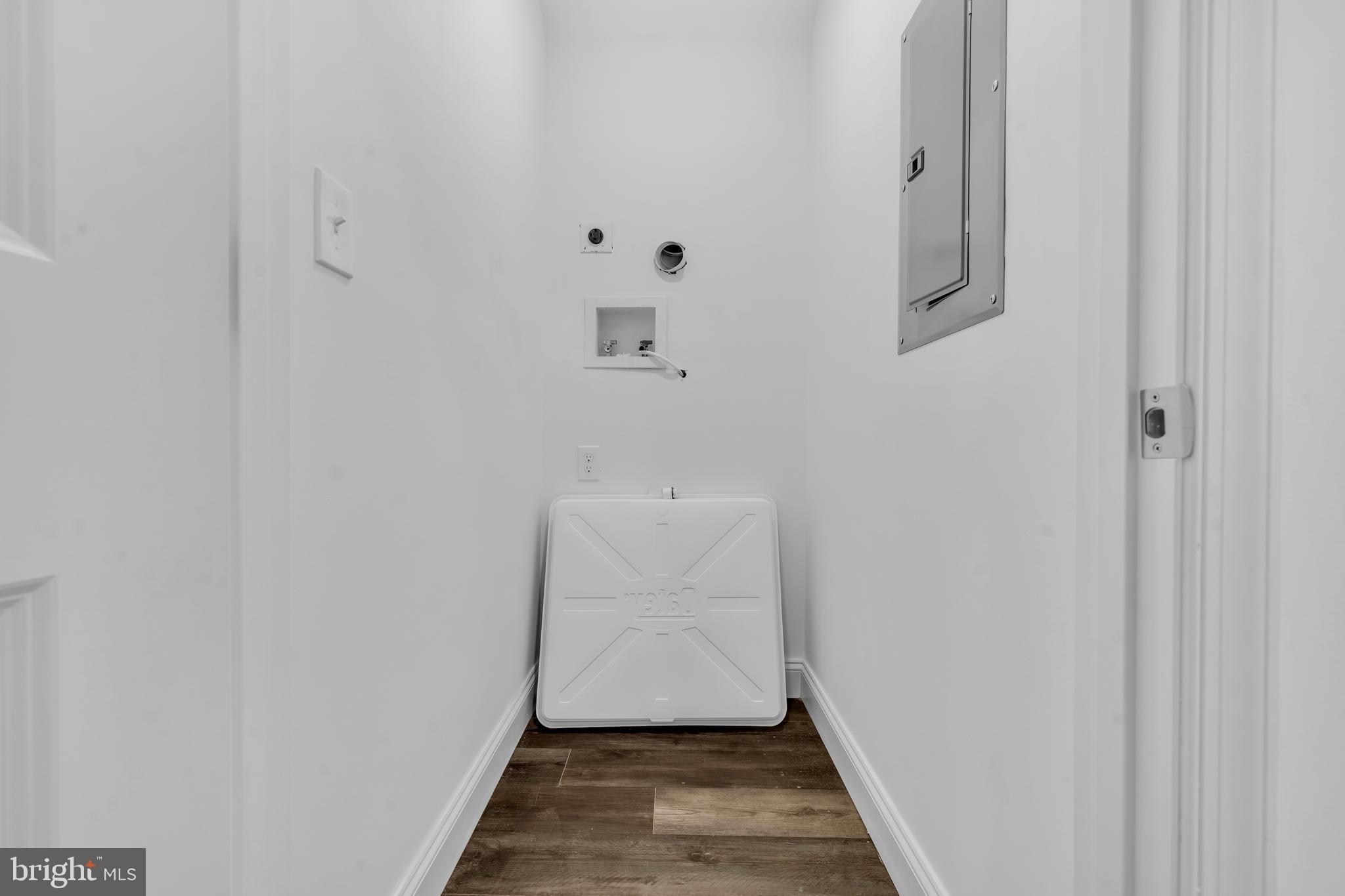 1710 Light Street Baltimore, MD 21230 - Photo 28 of 59 a view of a hallway with wooden floor