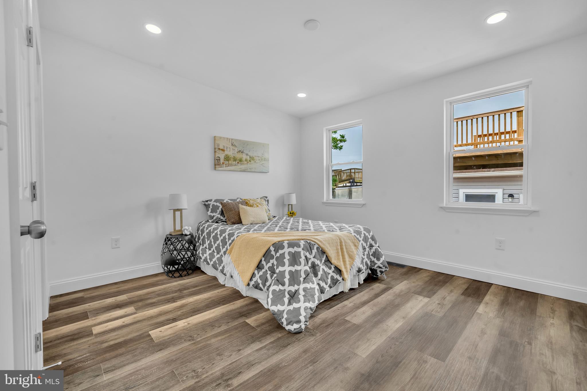 1710 Light Street Baltimore, MD 21230 - Photo 33 of 59 a bed sitting in a spacious bedroom next to a window