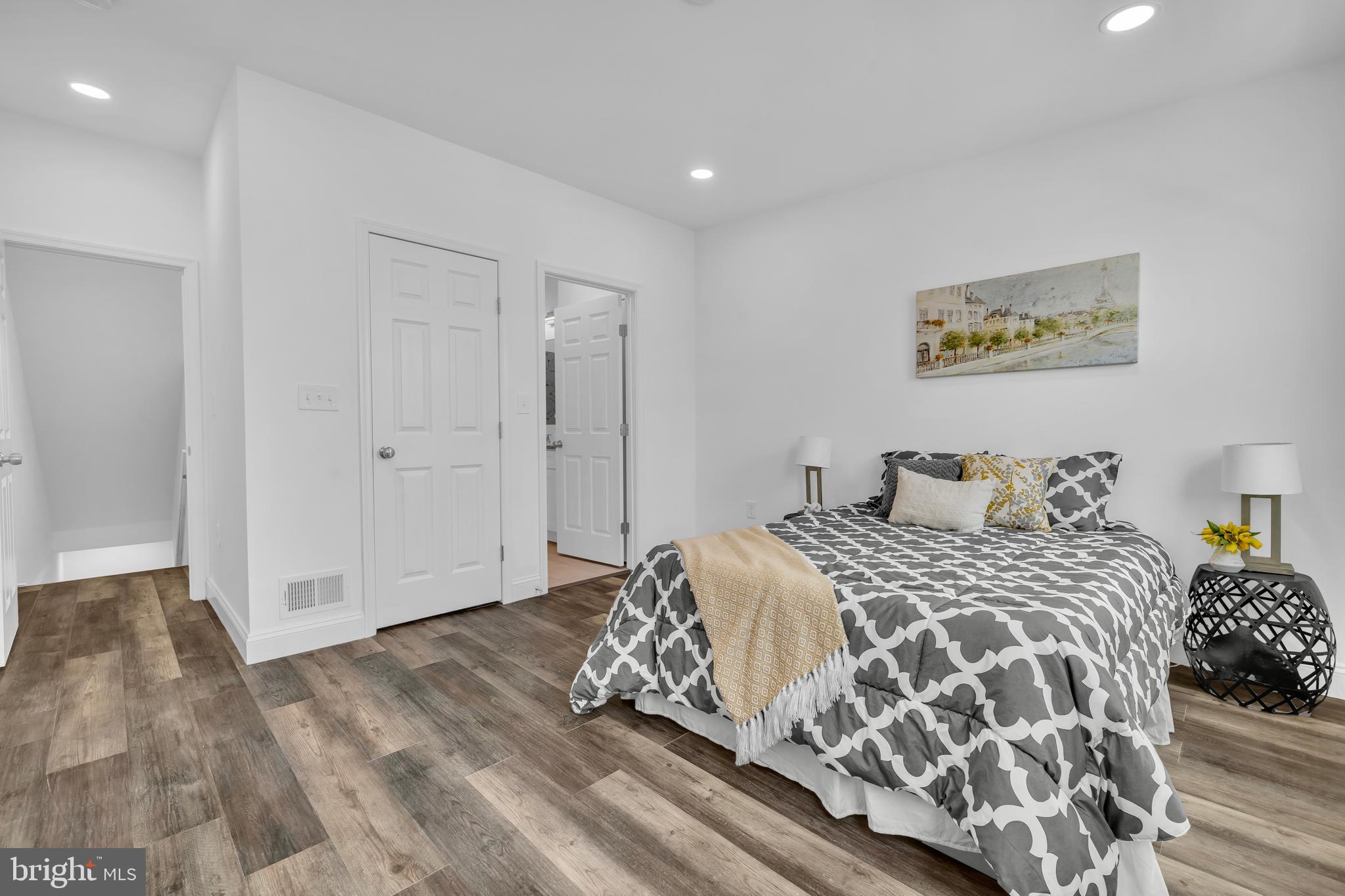 1710 Light Street Baltimore, MD 21230 - Photo 34 of 59 a bedroom with a bed and a painting