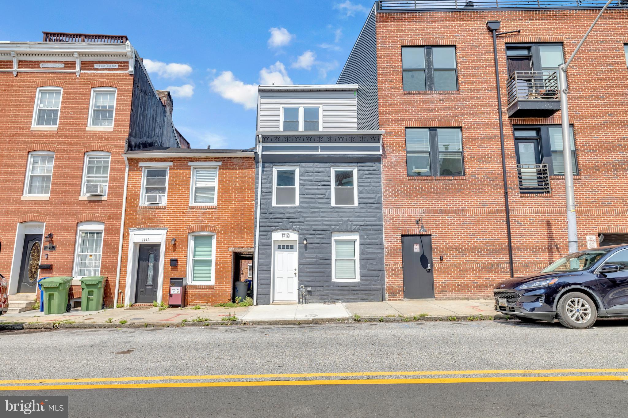 1710 Light Street Baltimore, MD 21230 - Photo 4 of 59 a car parked in front of a building