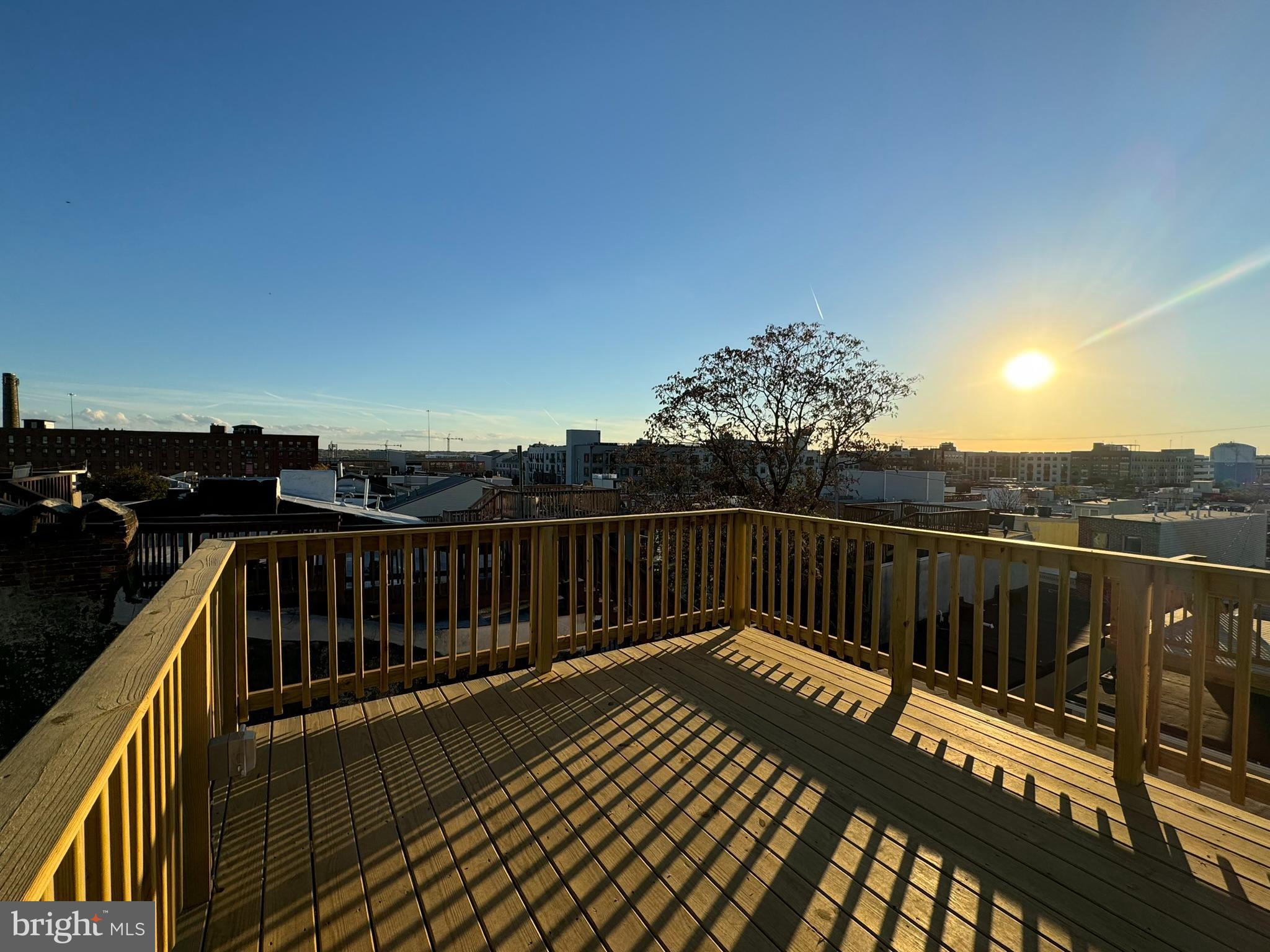 1710 Light Street Baltimore, MD 21230 - Photo 54 of 59 a balcony with wooden floor