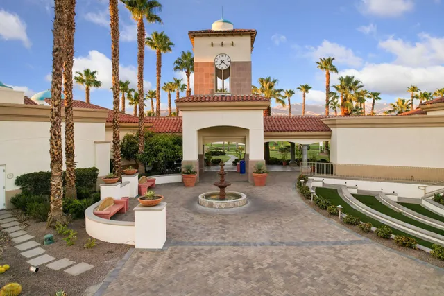 a front view of a house with swimming pool