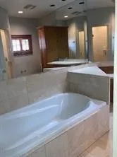 a bathroom with a sink and a vanity