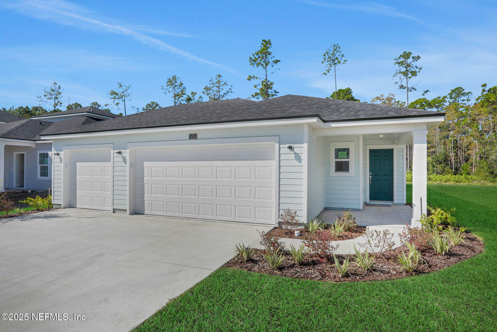 329 Pinzon Place St. Augustine, FL 32095 - Photo 1 of 36 a front view of a house with a yard