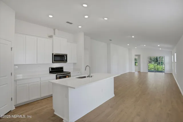 an empty room with windows