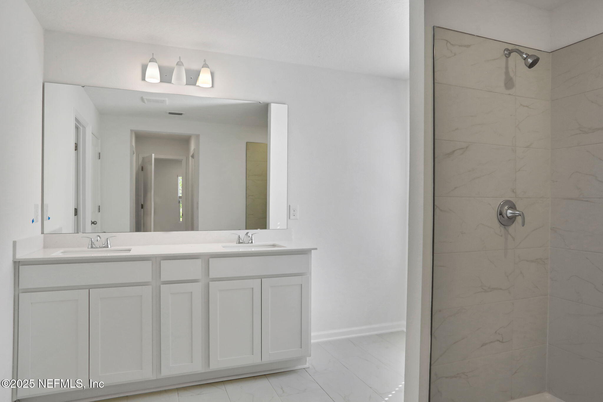 329 Pinzon Place St. Augustine, FL 32095 - Photo 30 of 36 a spacious bathroom with a double vanity sink mirror and