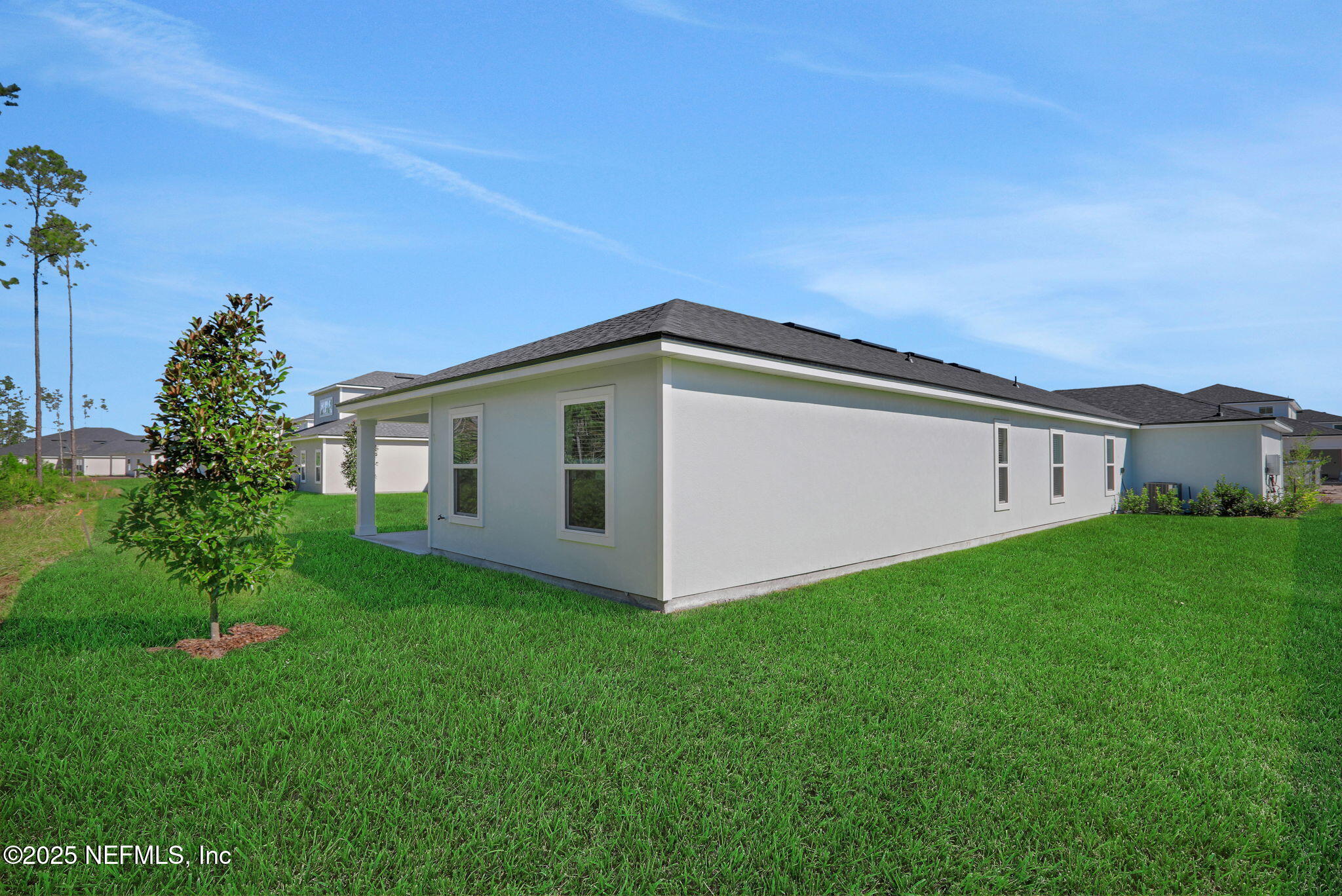 329 Pinzon Place St. Augustine, FL 32095 - Photo 8 of 36 a view of a house with backyard and garden