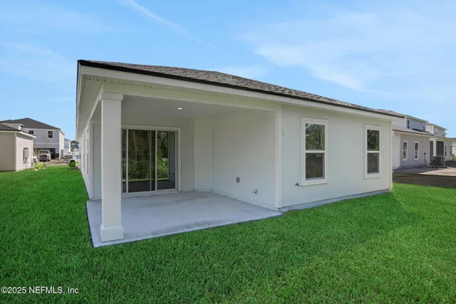 a view of a garden with a tree