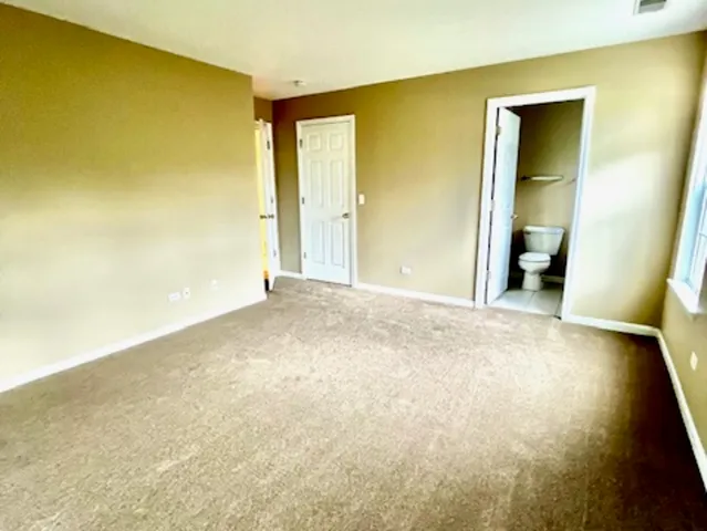 an empty room with a natural light