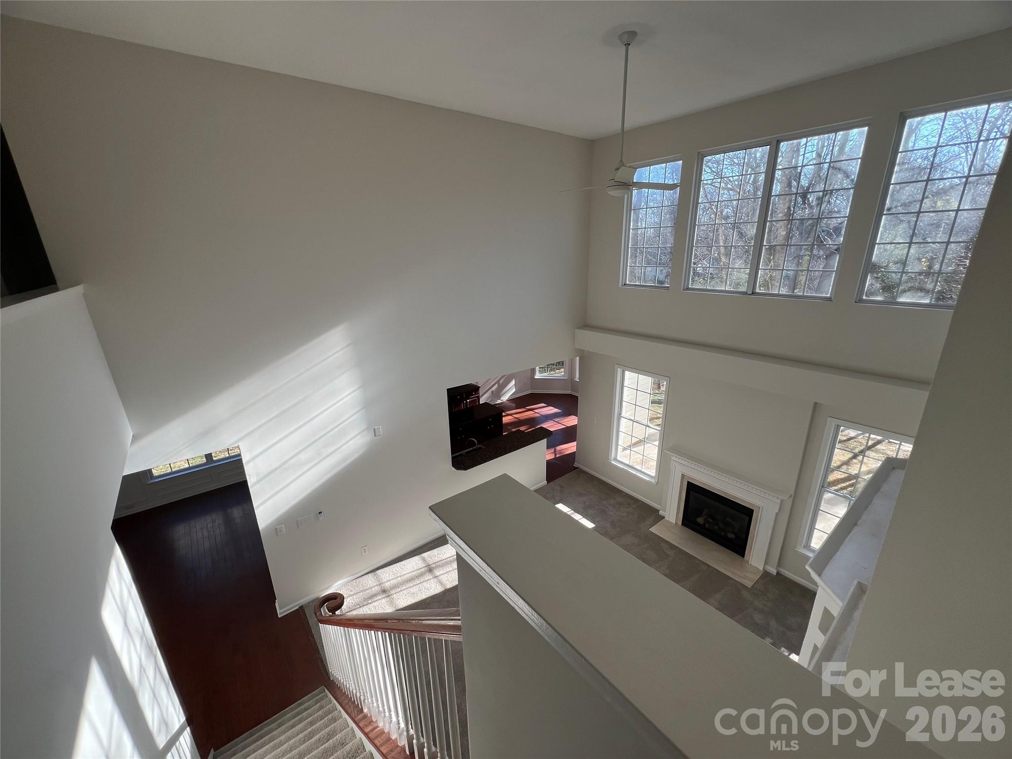 5002 Fine Robe Drive Indian Trail, NC 28079 - Photo 13 of 25 a view of a livingroom with furniture staircase windows and entryway