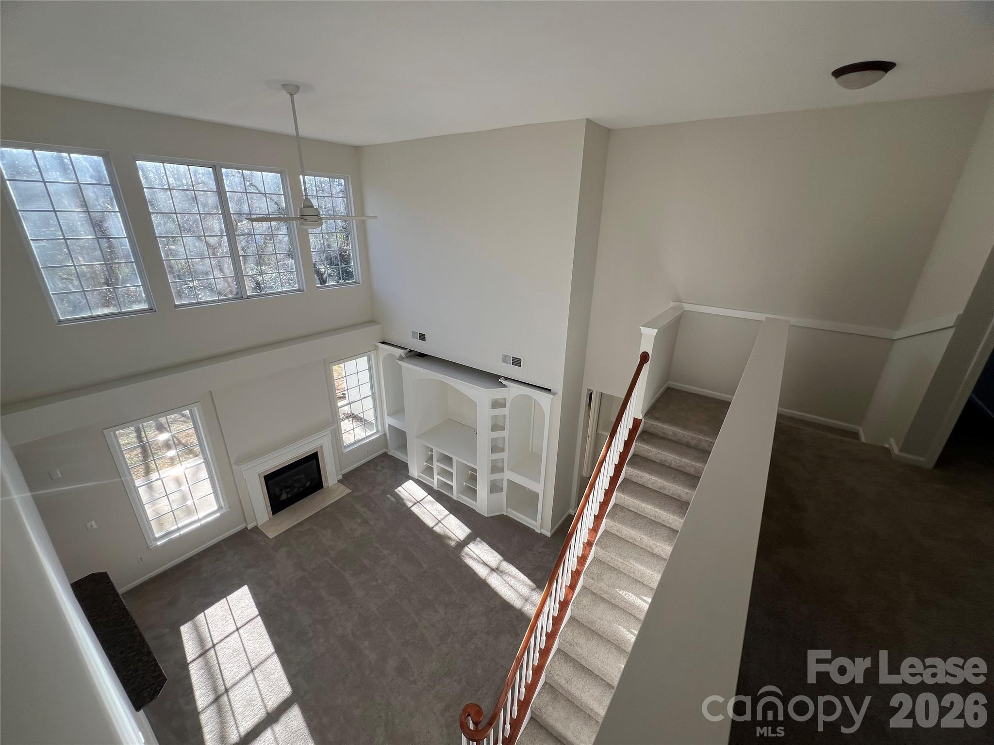 5002 Fine Robe Drive Indian Trail, NC 28079 - Photo 14 of 25 a living room with furniture and a fireplace