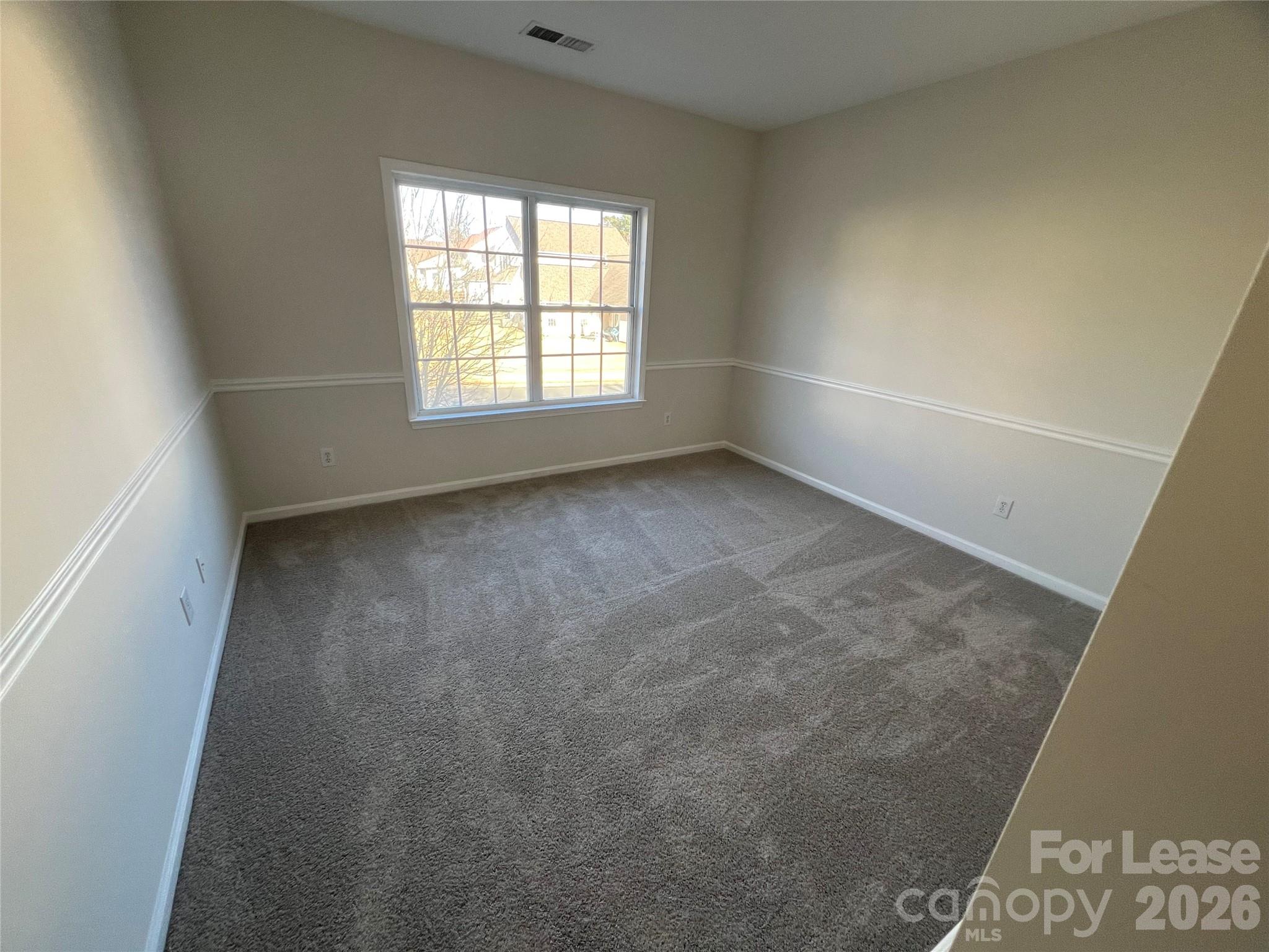 5002 Fine Robe Drive Indian Trail, NC 28079 - Photo 21 of 25 an empty room with a window