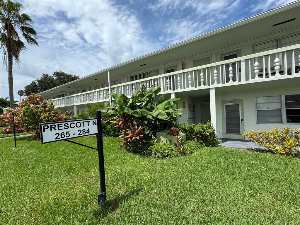 West Deerfield Beach Deerfield Beach, FL 33442 - Photo 1 of 22 a view of a house with a yard and potted plants