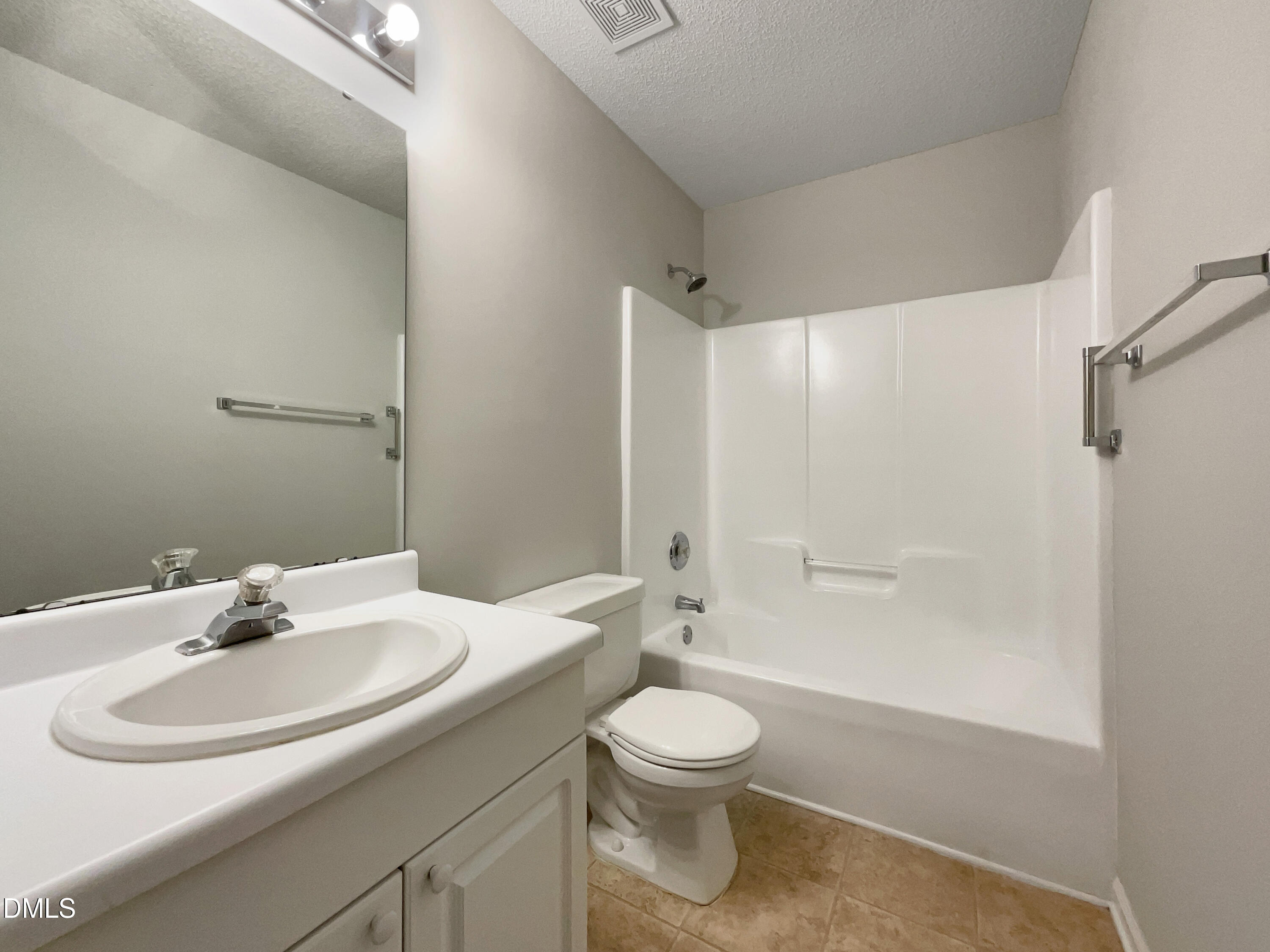 3501 Streams Of Fields Drive Raleigh, NC 27604 - Photo 11 of 16 a bathroom with a sink toilet and shower