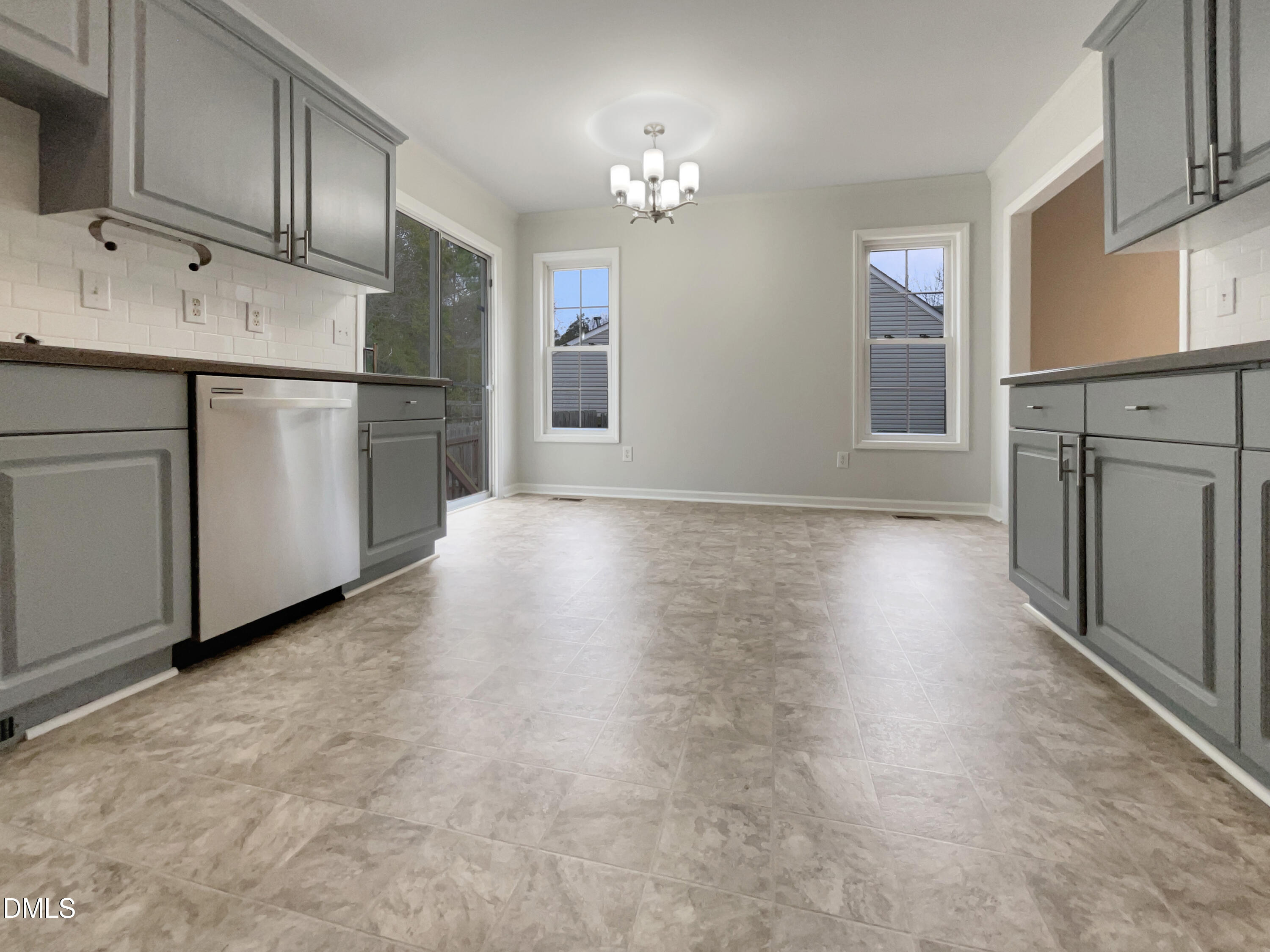 3501 Streams Of Fields Drive Raleigh, NC 27604 - Photo 7 of 16 a view of a kitchen with electric appliances