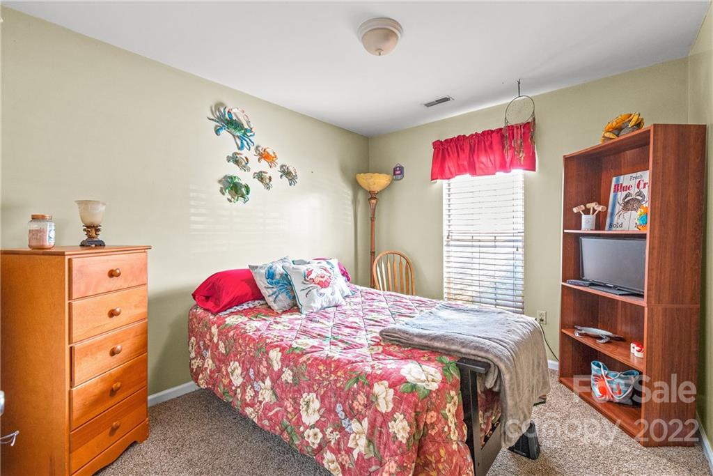 1531 Crestdale Road Rock Hill, SC 29732 - Photo 14 of 20 a bedroom with a bed and a window
