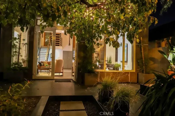 a view of a lobby with chair and tables