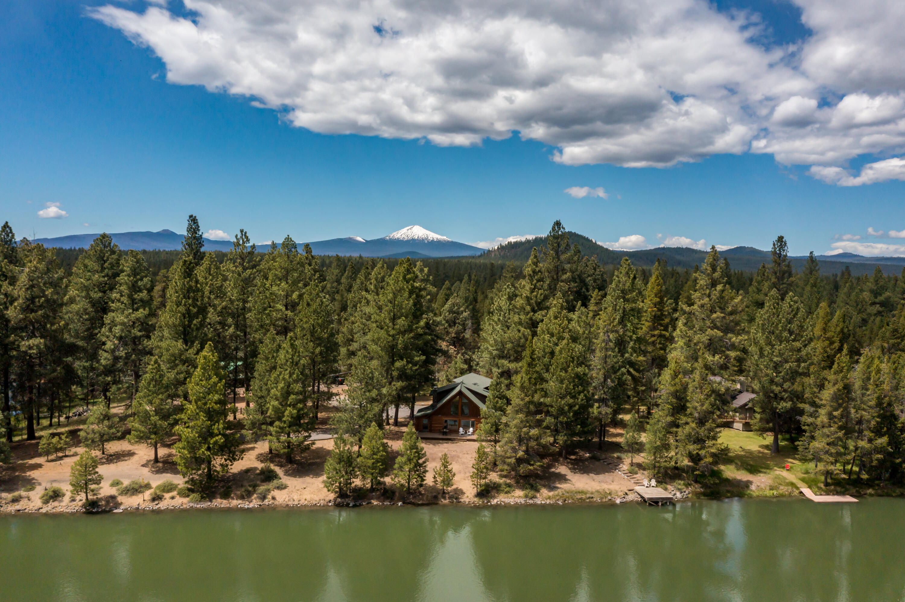 17026 Sharp Drive Bend, OR 97707 - Photo 57 of 72 a view of a lake with houses in the back