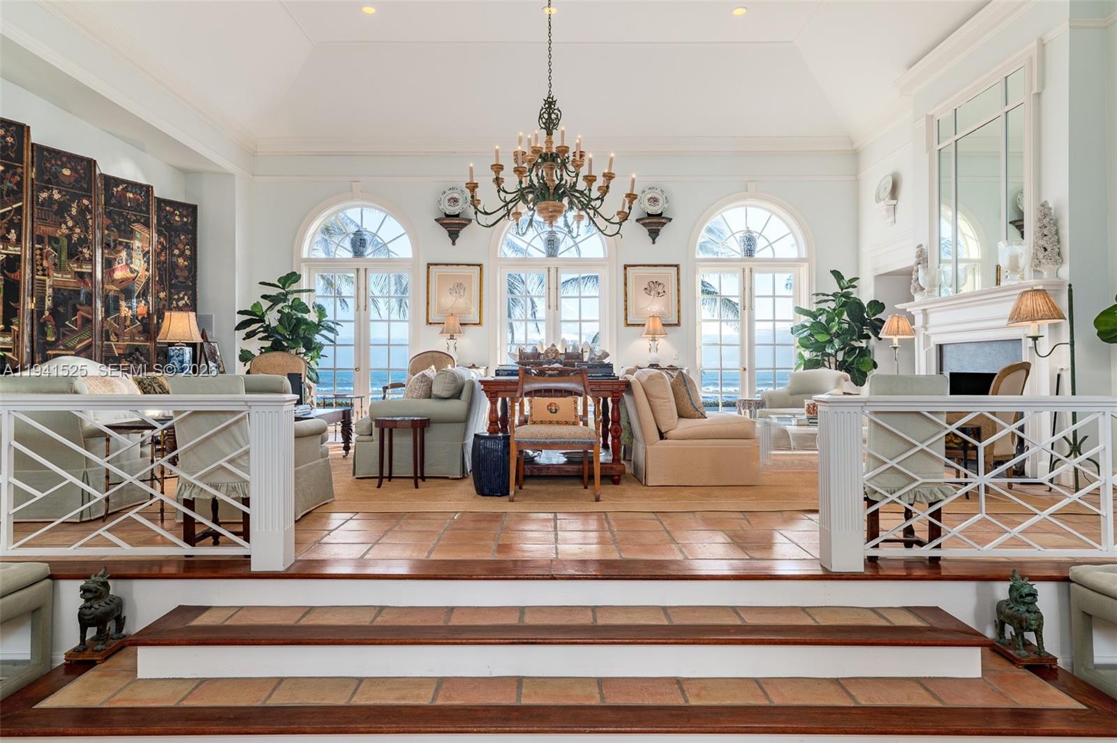 21 South Beach Road Jupiter Island, FL 33455 - Photo 14 of 45 a view of living room with furniture and fireplace