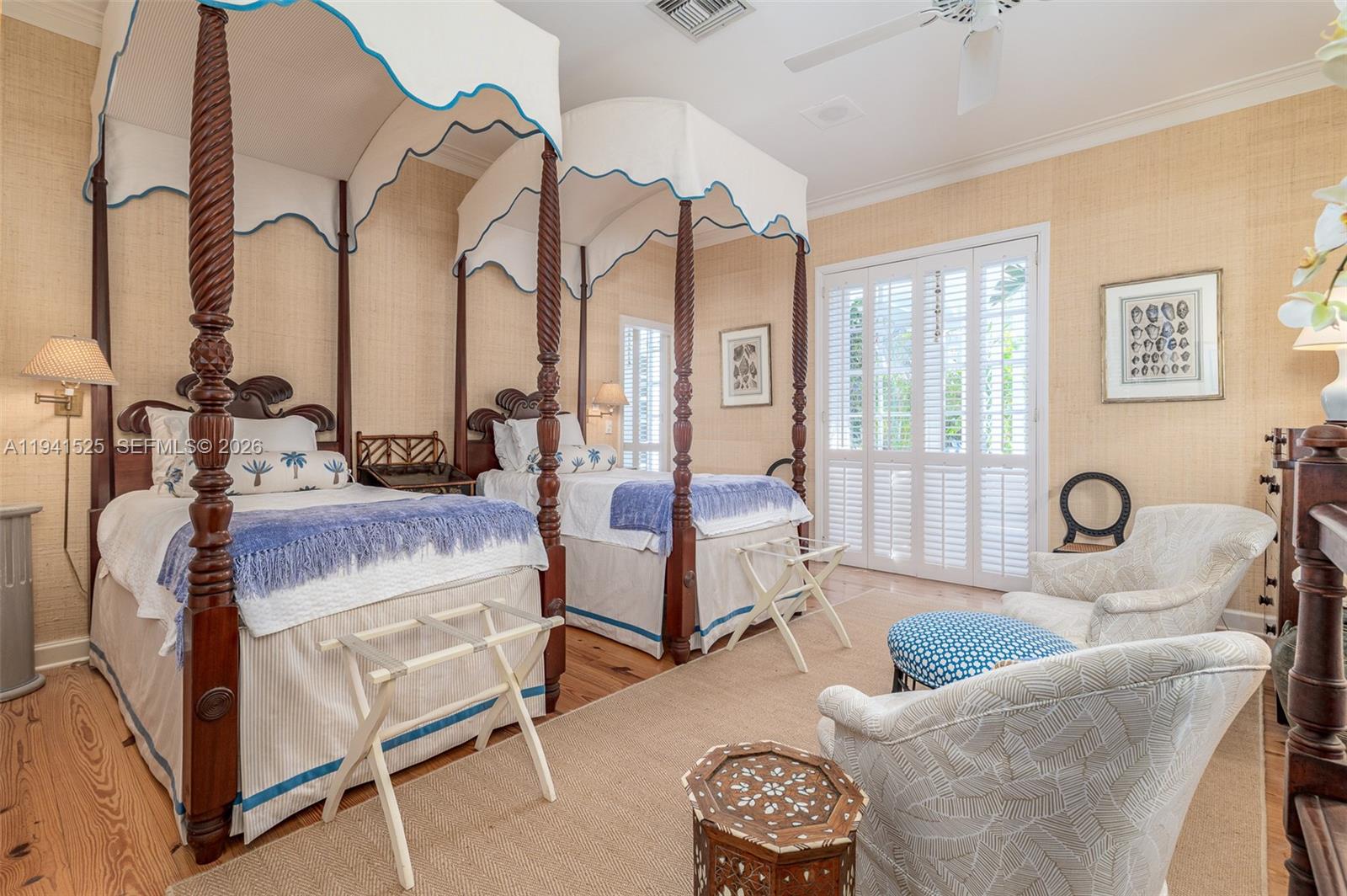 21 South Beach Road Jupiter Island, FL 33455 - Photo 24 of 45 a living room with furniture a couch and large window