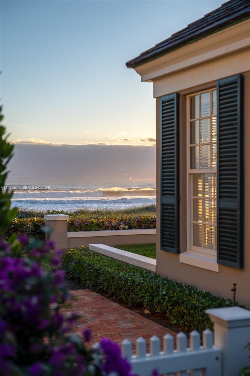 21 South Beach Road Jupiter Island, FL 33455 - Photo 30 of 45 a view of a terrace with a garden